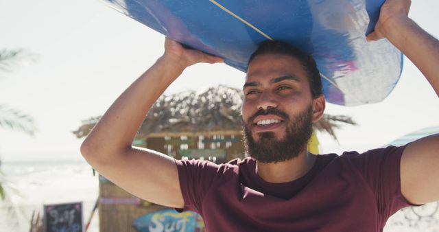 Smiling Man Holding Surfboard at Sunny Beach - Download Free Stock Images Pikwizard.com