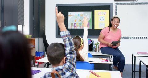 Enthusiastic Engagement in Modern Classroom with Digital Learning Tools - Download Free Stock Images Pikwizard.com