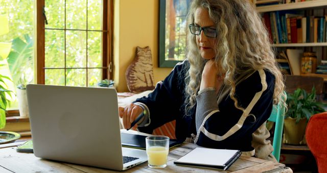 Older Woman Remote Working on Laptop at Home - Download Free Stock Images Pikwizard.com