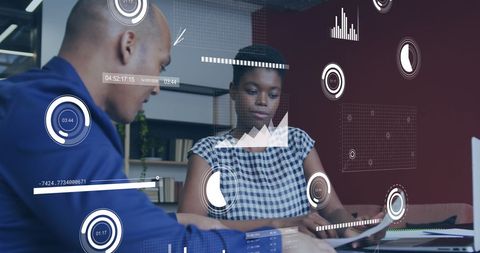 Professionals Analyzing Data with Digital Interface Overlay