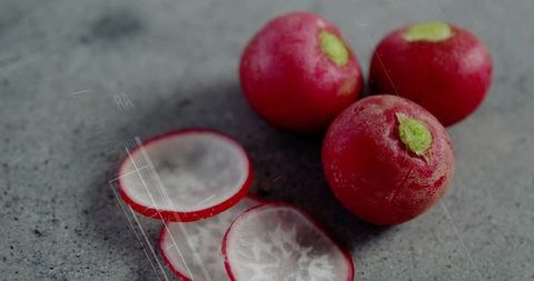 Fresh Red Radishes on Gray Stone Countertop