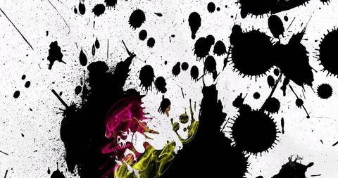 Dynamic ink splatter with colorful swirling smoke