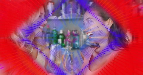 Smiling women clinking wine glasses at chic bar with vibrant red-purple graphic overlay