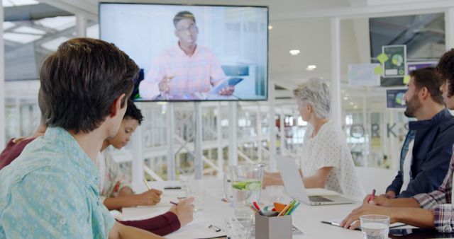 Diverse Team in Business Meeting with Video Conference - Download Free Stock Images Pikwizard.com