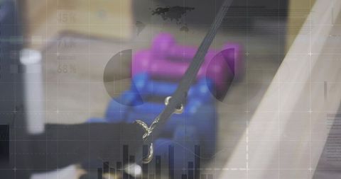 Worker holding strap securing swivel hook to blue equipment in warehouse with data overlay
