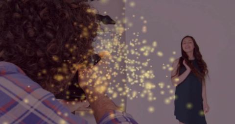 Photographer Captures Smiling Model in Black Dress with Bokeh Effect