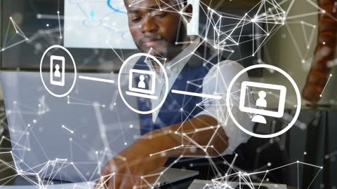 Businessman Utilizing Global Network Technologies in Modern Office