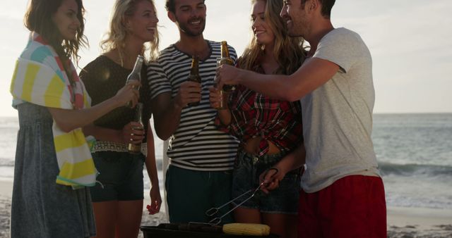 Friends Having Barbecue on Sunny Beach - Download Free Stock Images Pikwizard.com