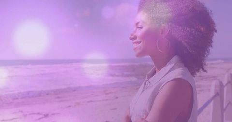 Woman Enjoying Serene Beachside View in Sunshine