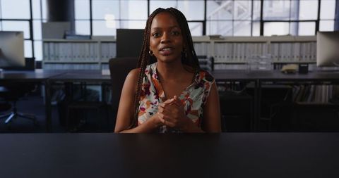 Professional Businesswoman Presenting Strategy in Modern Office