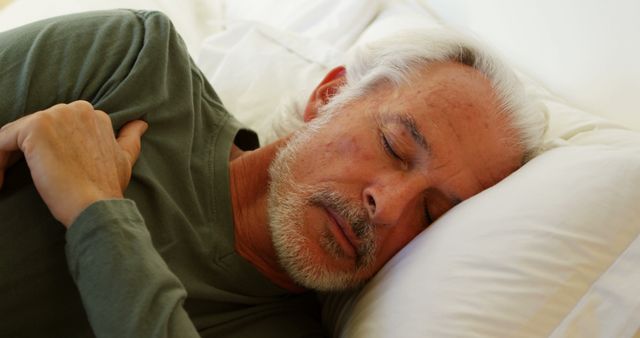 Senior Man Peacefully Sleeping on Pillow - Download Free Stock Images Pikwizard.com