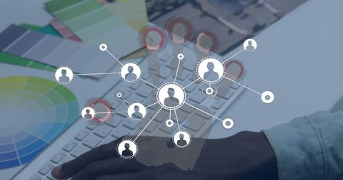 Digital networking with business icons overlay on keyboard