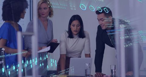 Diverse Team Analyzing Digital Financial Data in Office