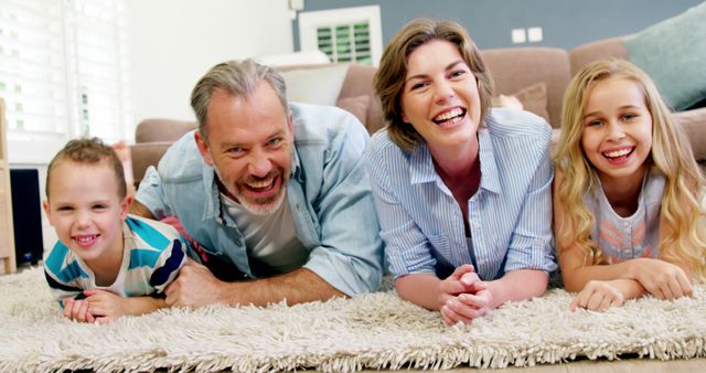 Happy Family Spending Time Together at Home on Living Room Floor - Download Free Stock Images Pikwizard.com