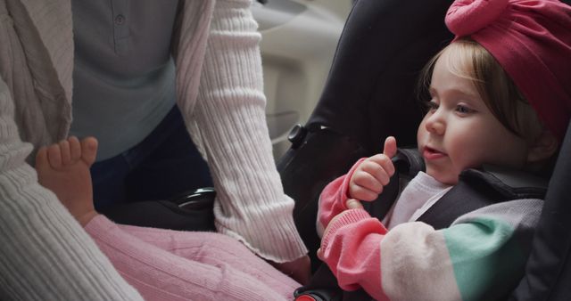 Parent Securing Child in Car Seat for Safety - Download Free Stock Images Pikwizard.com