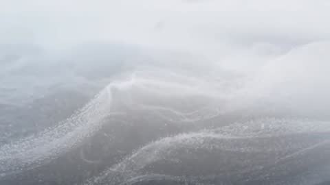 Foamy Ocean Surface Shifting Under Overcast Sky Slow Motion Seascape Loop