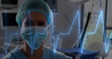 Masked Female Doctor in Operating Room with Cardiograph Overlay