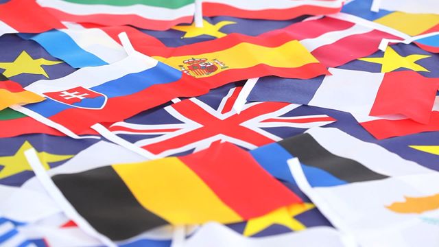 Flags of various European countries are laid out together, representing diversity and unity. Useful for topics on international relations, multicultural education, or events celebrating European heritage. Can enhance content on global studies or presentations on the European Union.