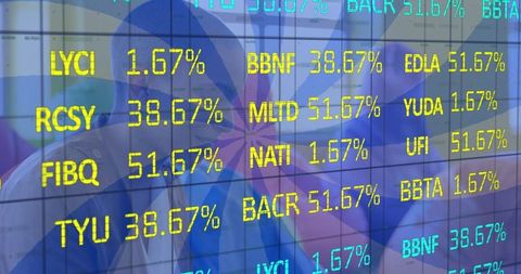 Businessman Analyzing Digital Ticker Display with Financial Data