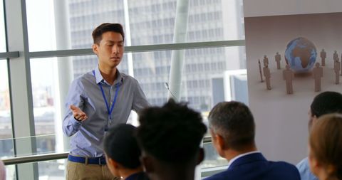 Asian Male Speaker Presenting at Business Seminar Conference - Download Free Stock Images Pikwizard.com