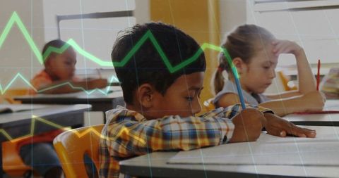 Focused student in classroom with graph overlay indicates educational analysis