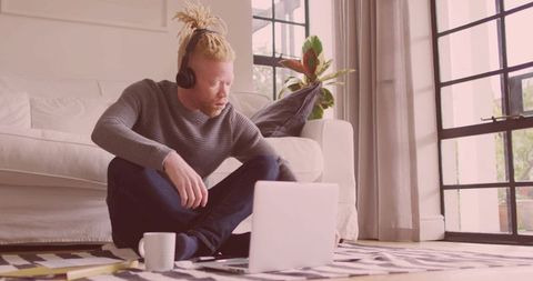 Casual Remote Work at Home With Headphones