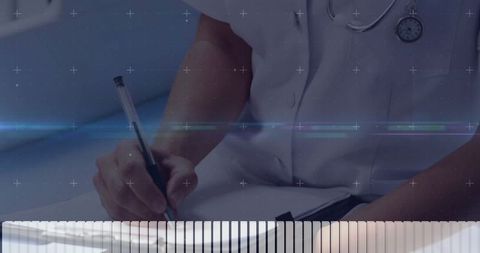 Female doctor writing medical notes during consultation