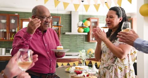 Senior Celebrating Birthday with Friends at Home