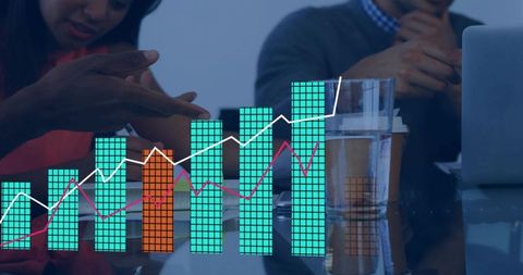 Business team analyzing data visualization and charts during collaborative meeting