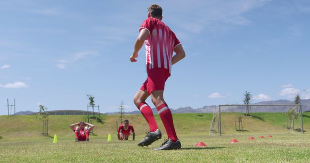 Youth Soccer Players Training on Field with Mountain View - Download Free Stock Images Pikwizard.com