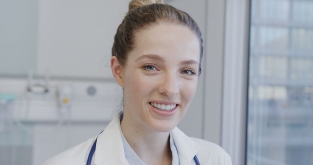 Smiling Female Doctor Standing in Medical Office - Download Free Stock Images Pikwizard.com