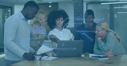 Diverse team collaborating in contemporary office space