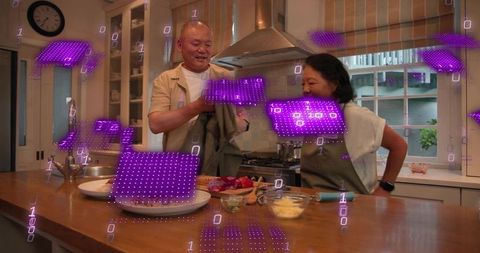 Chinese couple cooking in modern home kitchen with augmented reality holographic overlays