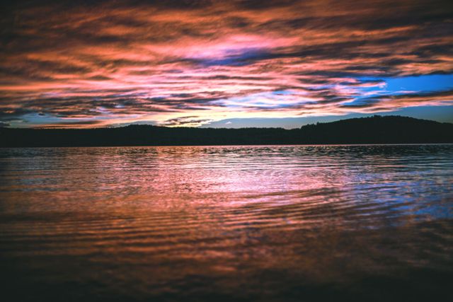 Stunning Sunset Over Calm Lake with Colorful Sky - Download Free Stock Photos Pikwizard.com