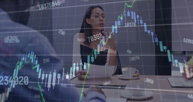 Businesswoman Analyzing Stock Market Data in Boardroom Meeting - Download Free Stock Images Pikwizard.com