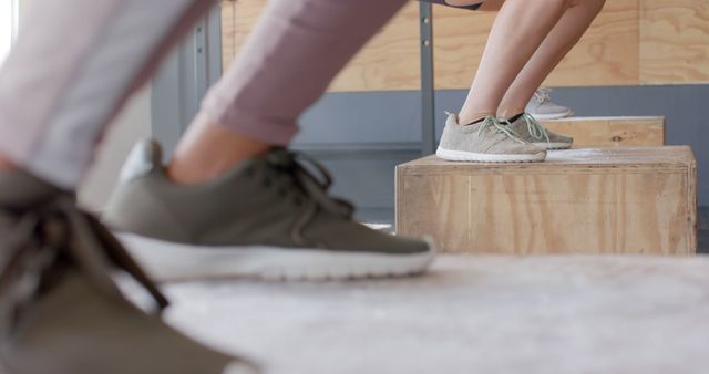 People Exercising with Step Platforms in Gym - Download Free Stock Images Pikwizard.com