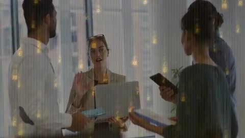 Diverse Team Collaborating on Tech Project with Digital Interface