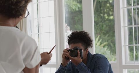 Photographer Capturing Wedding Celebration at Home