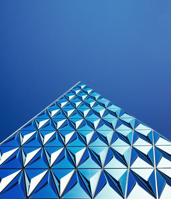 Futuristic Architecture Reflecting Sky on Triangular Glass Panels - Download Free Stock Photos Pikwizard.com