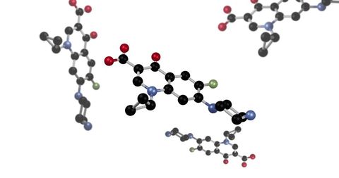 Digitally rendered rotating molecular structures