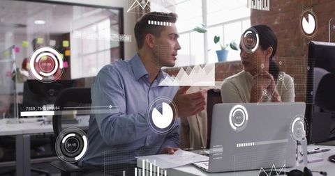 Collaborating and analyzing digital data with futuristic HUD overlays in modern office