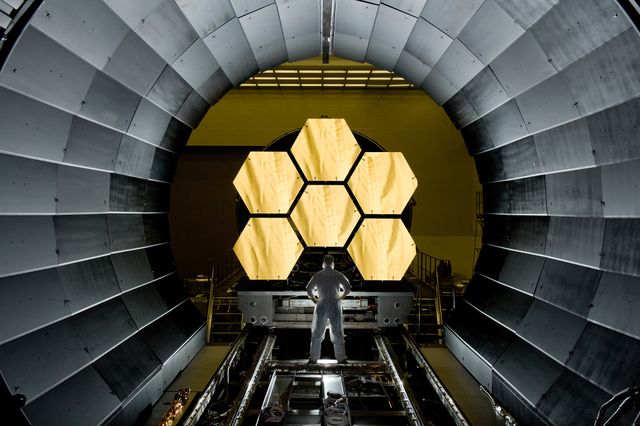 NASA image release April 14, 2011  NASA engineer Ernie Wright looks on as the first six flight ready James Webb Space Telescope's primary mirror segments are prepped to begin final cryogenic testing at NASA's Marshall Space Flight Center in Huntsville, Ala.   Credit: NASA/MSFC/David Higginbotham  To read more go to: <a href="http://www.nasa.gov/centers/marshall/news/jwst/11-111.html" rel="nofollow">www.nasa.gov/centers/marshall/news/jwst/11-111.html</a>  <b><a href="http://www.nasa.gov/centers/goddard/home/index.html" rel="nofollow">NASA Goddard Space Flight Center</a></b> enables NASA’s mission through four scientific endeavors: Earth Science, Heliophysics, Solar System Exploration, and Astrophysics. Goddard plays a leading role in NASA’s accomplishments by contributing compelling scientific knowledge to advance the Agency’s mission.  <b>Follow us on <a href="http://twitter.com/NASA_GoddardPix" rel="nofollow">Twitter</a></b>  <b>Join us on <a href="http://www.facebook.com/pages/Greenbelt-MD/NASA-Goddard/395013845897?ref=tsd" rel="nofollow">Facebook</a></b>