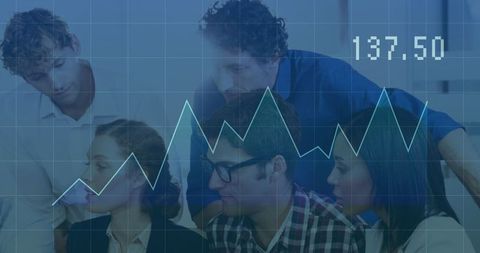 Professionals Analyzing Financial Data with Graph Overlay