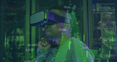 Tech specialist using VR headset exploring real-time green data visualizations in lab