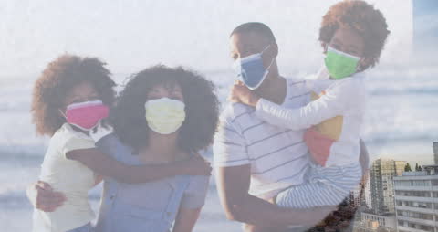 Family Enjoying Beach Day During Pandemic