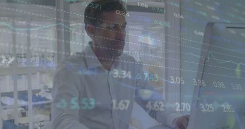 Businessman Analyzing Financial Data on Office Computer - Download Free Stock Images Pikwizard.com