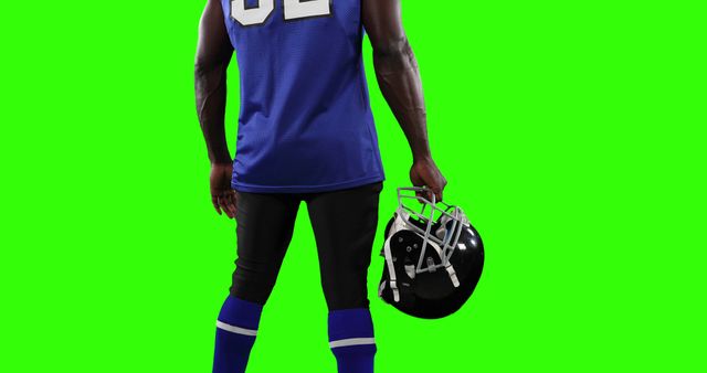American Football Player Standing with Helmet Back View - Download Free Stock Images Pikwizard.com