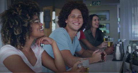 Happy Friends Enjoying Drinks at Bar Gathering - Download Free Stock Images Pikwizard.com