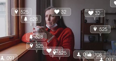 Woman at Window with Facial Mask and Social Media Icons