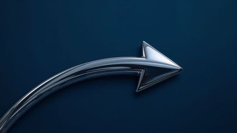 Metallic futuristic curved arrow abstract against dark blue